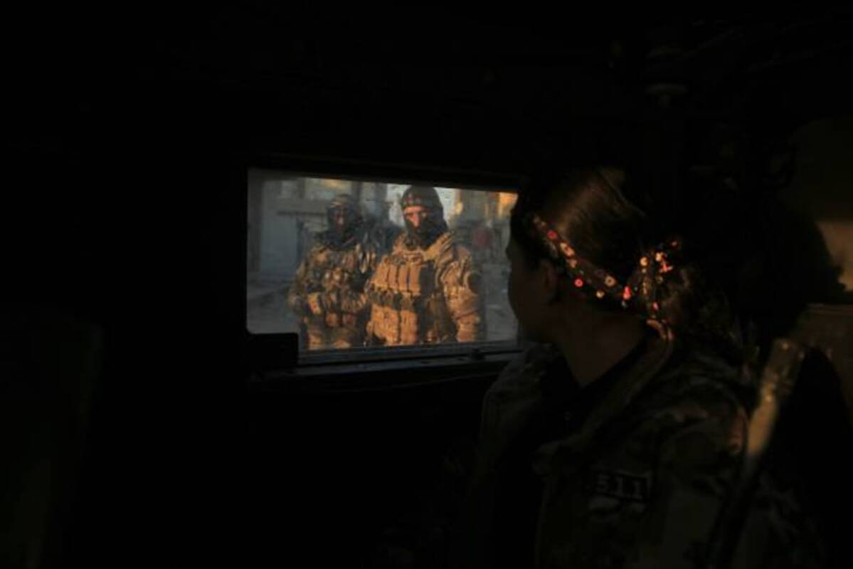 Soldiers with the U.S.-backed Syrian Democratic Forces set a checkpoint in Hassakeh, Syria, on Jan. 25. (Hogir Al Abdo/AP)