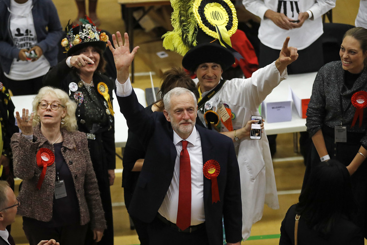Jeremy Corbyn celebrates in London. (Frank Augstein/AP)</p>  