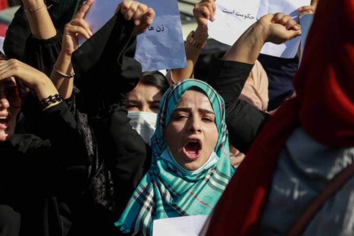 Afghan women shout slogans during a protest to demand that the Taliban government allow the reopening of girls schools and to provide ample employment opportunities, in Kabul, Afghanistan. &nbsp;(STRINGER/EPA-EFE/Shutterstock)