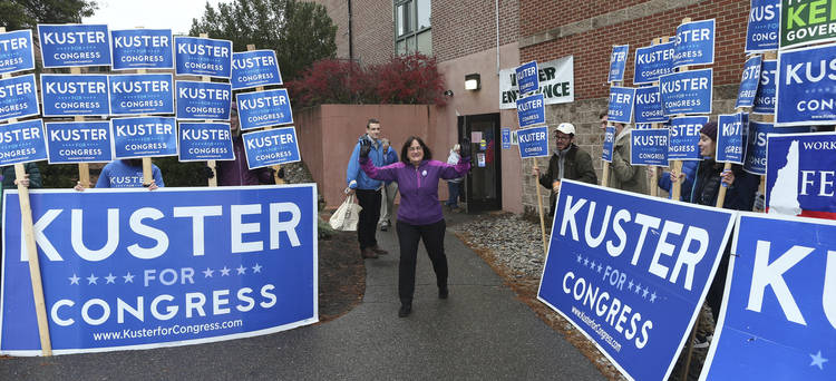 Rep. Annie Kuster (D-N.H.) waves to supporters after voting last November in Contoocook, N.H. She easily won a fourth term. (Geoff Forester/Concord Monitor/AP)  