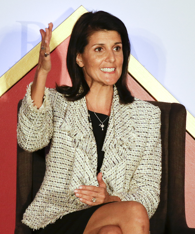 Nikki Haley celebrates Trump's win at the RGA meeting yesterday. (John Raoux/AP)</p>  