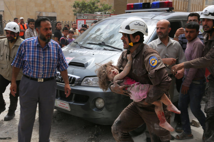 This girl was injured after an airstrike on&nbsp;the rebel-controlled city of Idlib, Syria, on Wednesday.&nbsp;(Reuters/Ammar Abdullah)</p>  