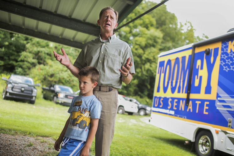 Pat Toomey campaigns with&nbsp;his son Duncan, 6, at a car show in Pennsylvania on Sunday. He's&nbsp;doing a statewide bus tour.&nbsp;(Photo By Tom Williams/CQ Roll Call)</p>  