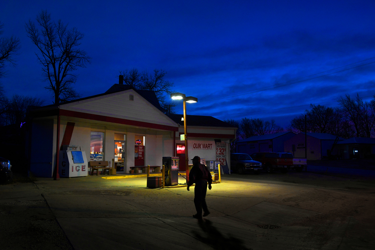 &nbsp;Russell Paulson joins other local older gents at the Quik Mart in Kiron, Iowa for coffee. (Michael S. Williamson/The Washington Post)</p>  