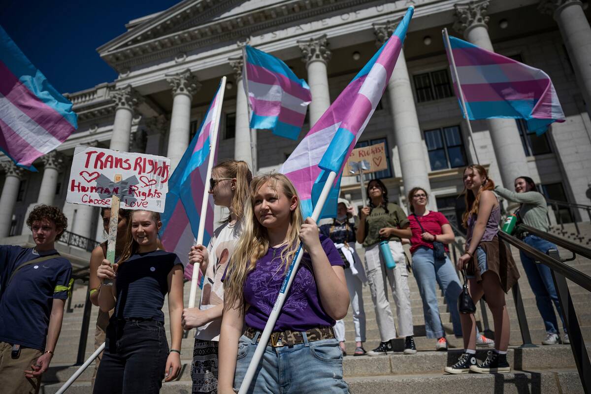 Misy Sifre, 17, and others protest at the Capitol in Salt Lake City on March 25. Utah Republicans overrode a veto to approve a ban on transgender athletes playing on girls' teams. (Spenser Heaps/The Deseret News/AP)