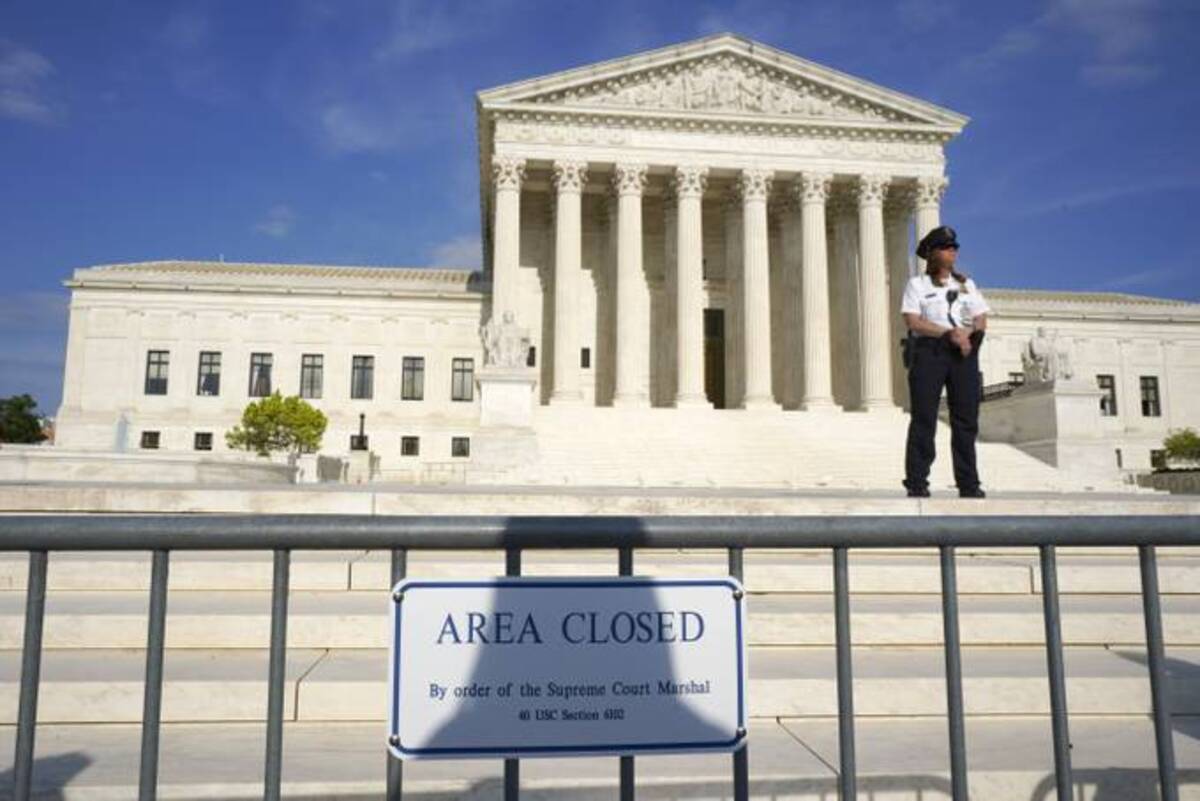 The steps leading to the U.S. Supreme Court are closed on Tuesday after a draft of an opinion was released indicating that Roe v. Wade would be overturned. (Bonnie Jo Mount/The Washington Post)