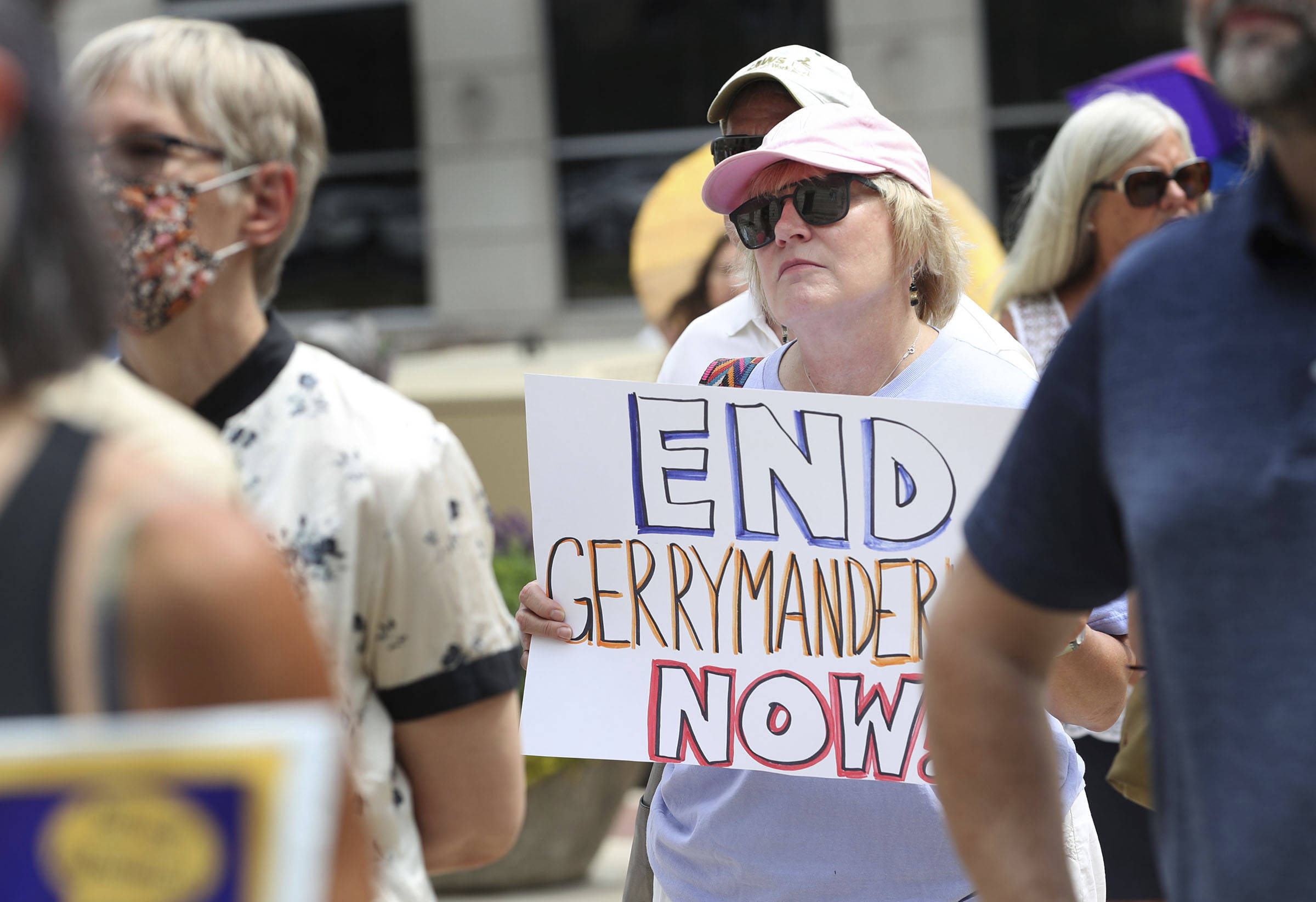 On Wednesday in Indianapolis, people protest against gerrymandering. The obscure process is getting more attention. (Kelly Wilkinson /The Indianapolis Star via AP)