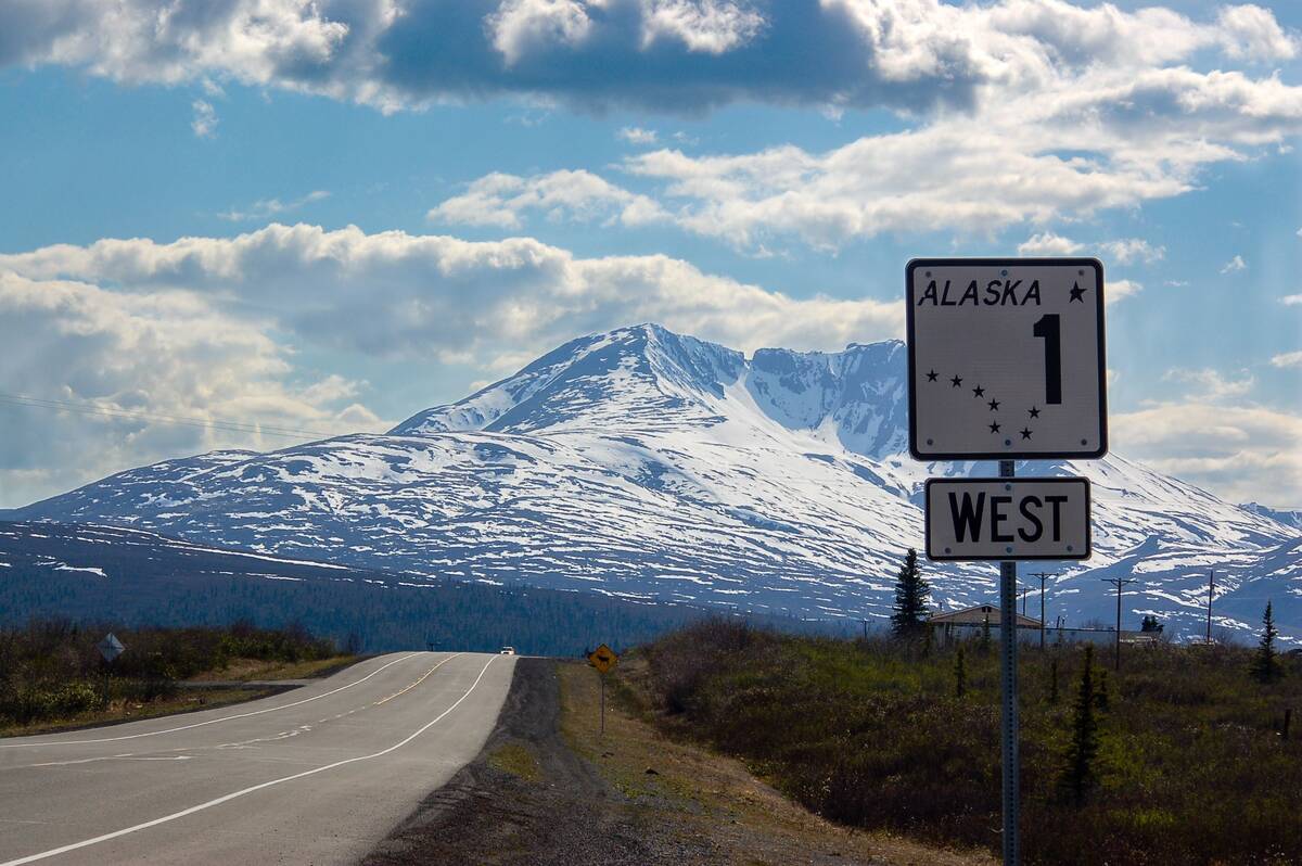 The Alaska road sign number one shows direction to the west on scenic route of Glenn highway. (iStock)