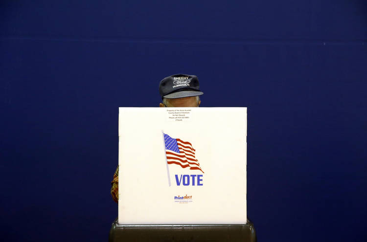 A voter casts a ballot on Nov. 6, 2018, at a polling place inside Lake Shore Elementary School in Pasadena, Md. (Patrick Semansky/AP)  