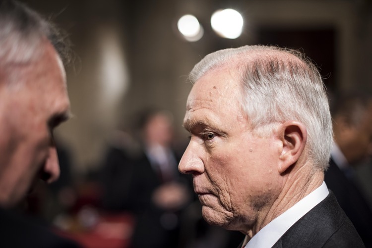 Jeff Sessions speaks to staff during a break in the action on Tuesday. (Melina Mara/The Washington Post)</p>  