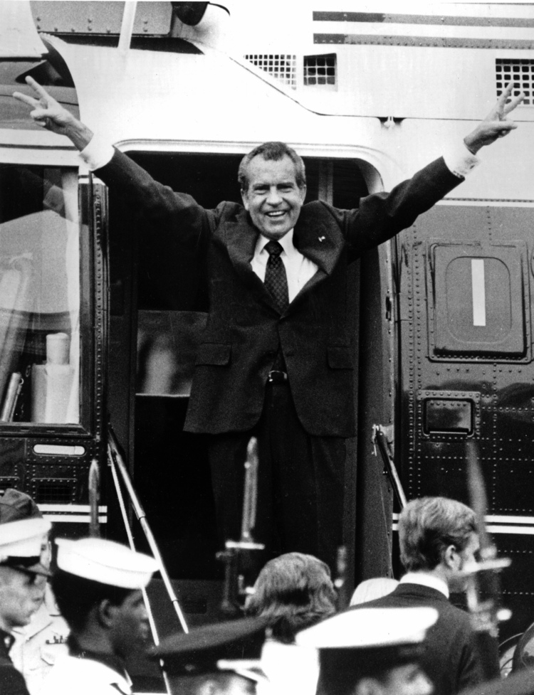Richard Nixon waves goodbye after resigning&nbsp;the presidency on Aug. 9, 1974. (AP Photo, File)</p>  