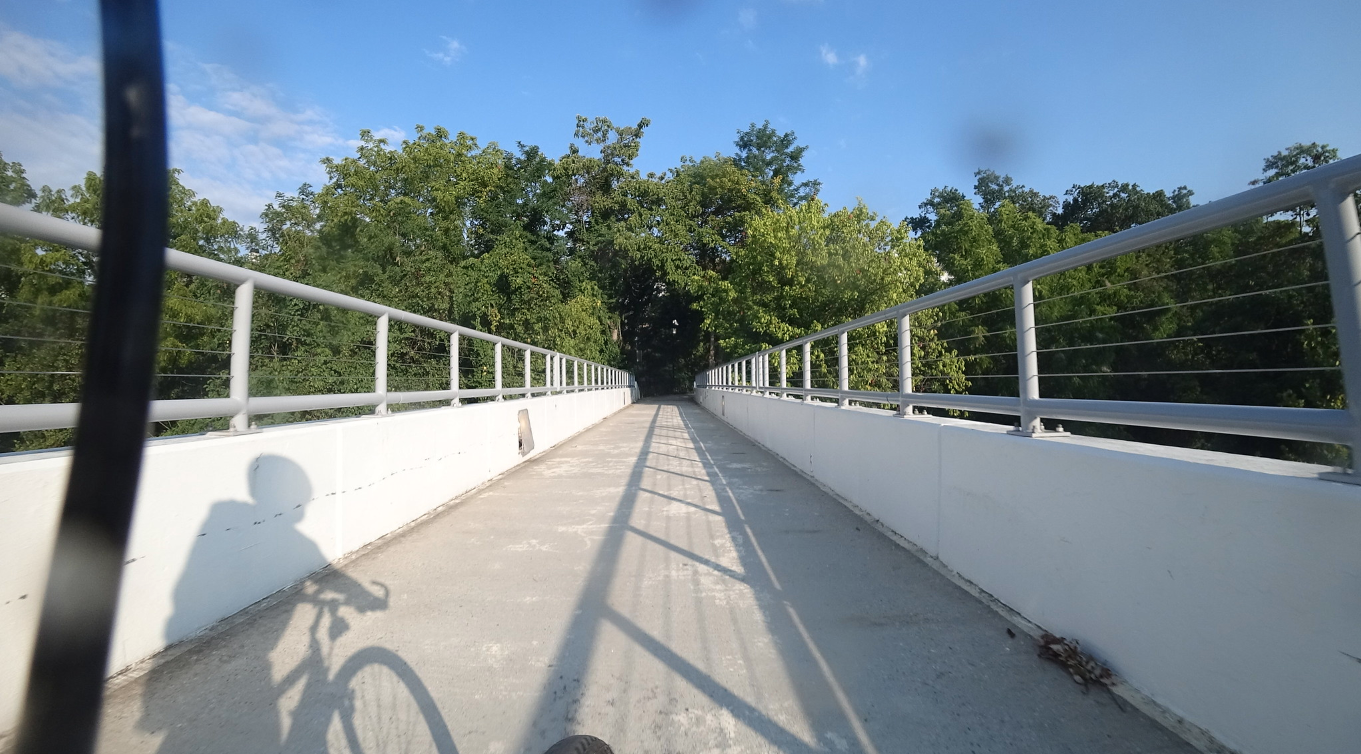 More sun than clouds on this bike ride over a footbridge July 24. (by F150Terp/CWG.news/Photos Flickr)