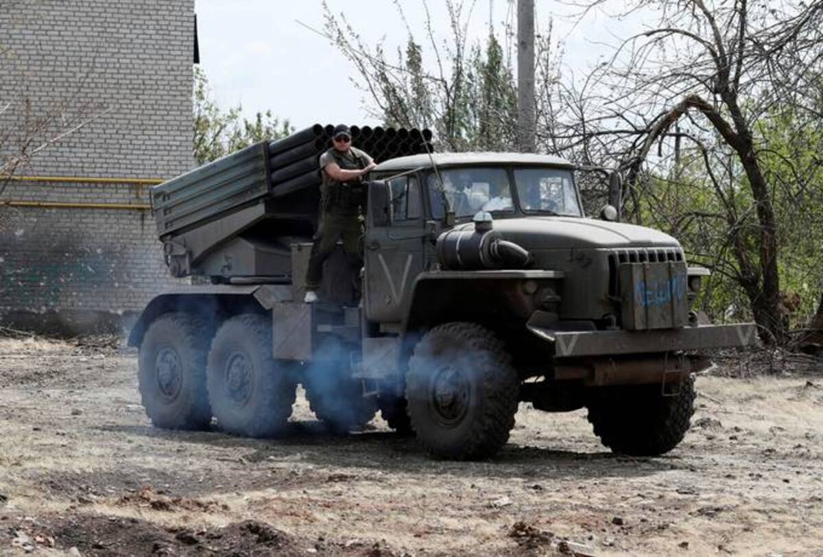 Service members of pro-Russian troops drive a BM-21 Grad multiple rocket launch system during Ukraine-Russia conflict in the town of Popasna in the Luhansk Region, Ukraine on May 26. (REUTERS/Alexander Ermochenko)