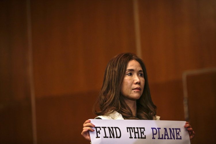 Relatives of Malaysia Airlines flight 370 passengers hold a press conference in Kuala Lumpur. (EPA/Fazry&nbsp;Ismail)&nbsp;</p>  