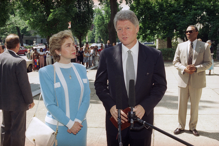 Hillary listens as Bill speaks about a U.S. missile strike against Iraq in 1993. (AP/Greg Gibson)</p>