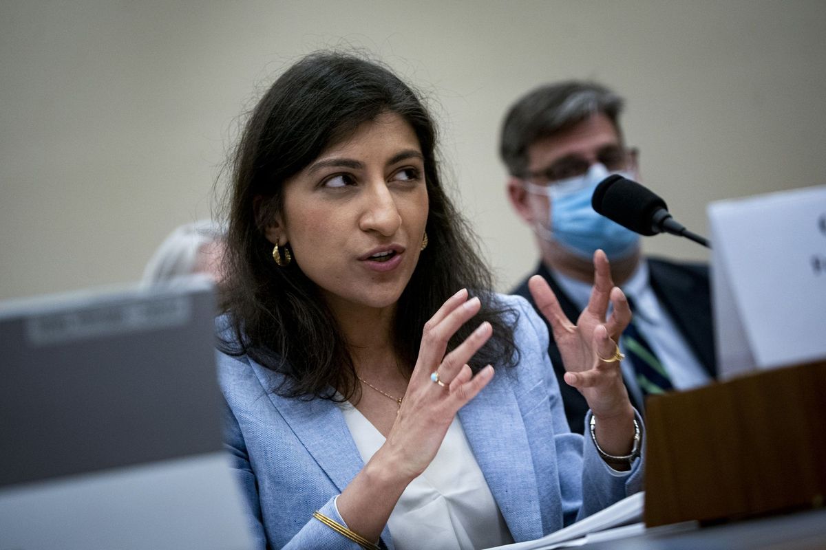 Federal Trade Commission Chair Lina Khan testifies at a House hearing in May 2022. (Al Drago/Bloomberg News)