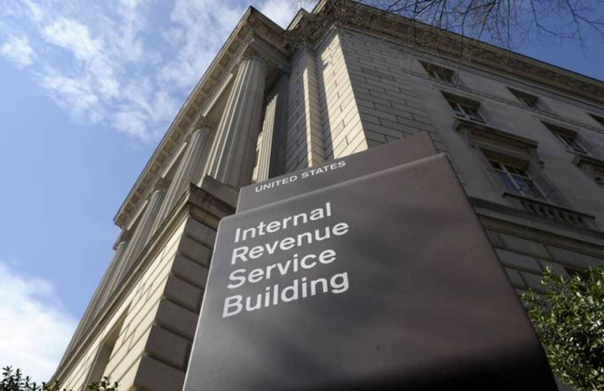 The announcement came just a day after the IRS said it wouldn't require people to submit videos of themselves to access their tax records online. (Susan Walsh/AP)