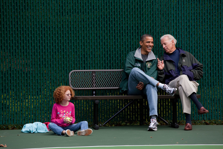 Obama, Biden and Claire Duncan, Arne Duncan's daughter, watch a tennis match at Camp David in 2010. (White House Photo by Pete Souza)</p>  