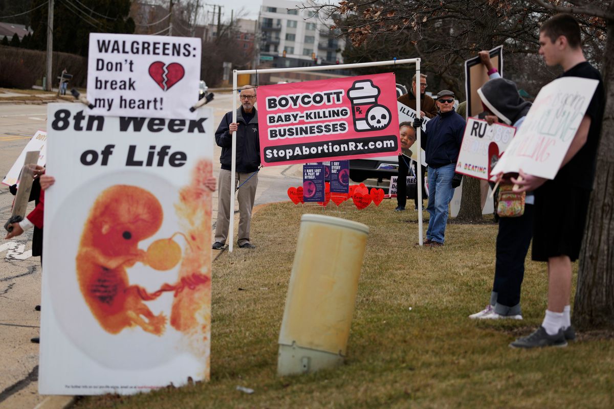 Antiabortion groups protest outside Walgreens headquarters in Deerfield, Ill. (Nam Y. Huh/AP)