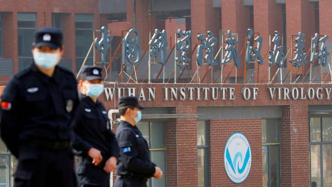Security outside the Wuhan Institute of Virology. (Thomas Peter/Reuters)