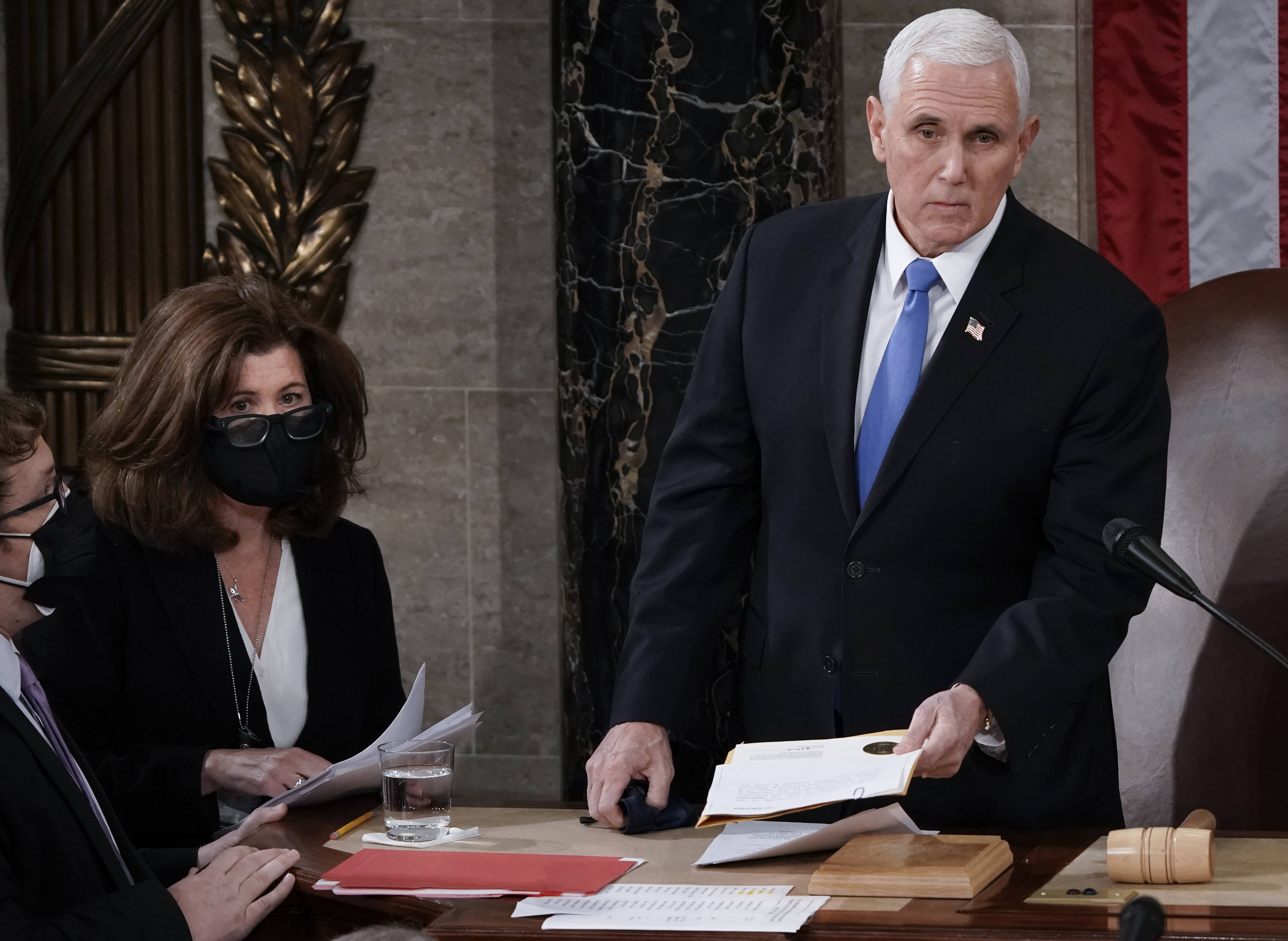 Senate Parliamentarian Elizabeth MacDonough works beside Vice President Mike Pence on Jan. 6, moments before the insurrection. MacDonough grabbed the electoral ballots to keep them safe. (AP Photo/J. Scott Applewhite.)