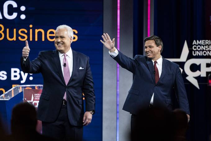 CPAC leader Matt Schlapp and Florida Gov. Ron DeSantis (R) speak during the Conservative Political Action Conference held at the Hyatt Regency Orlando on Feb 26, 2021. (Jabin Botsford/The Washington Post)
