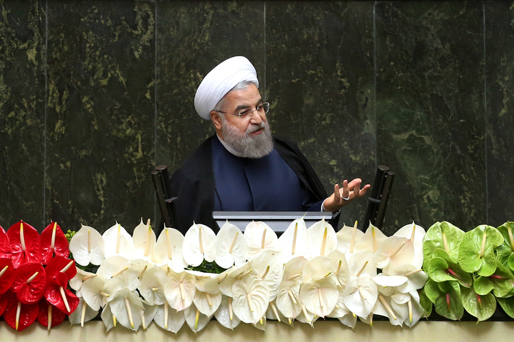 Iranian President Hassan Rouhani speaks during the inauguration of the new parliament. (AP Photo/Ebrahim Noroozi, File)</p>  
