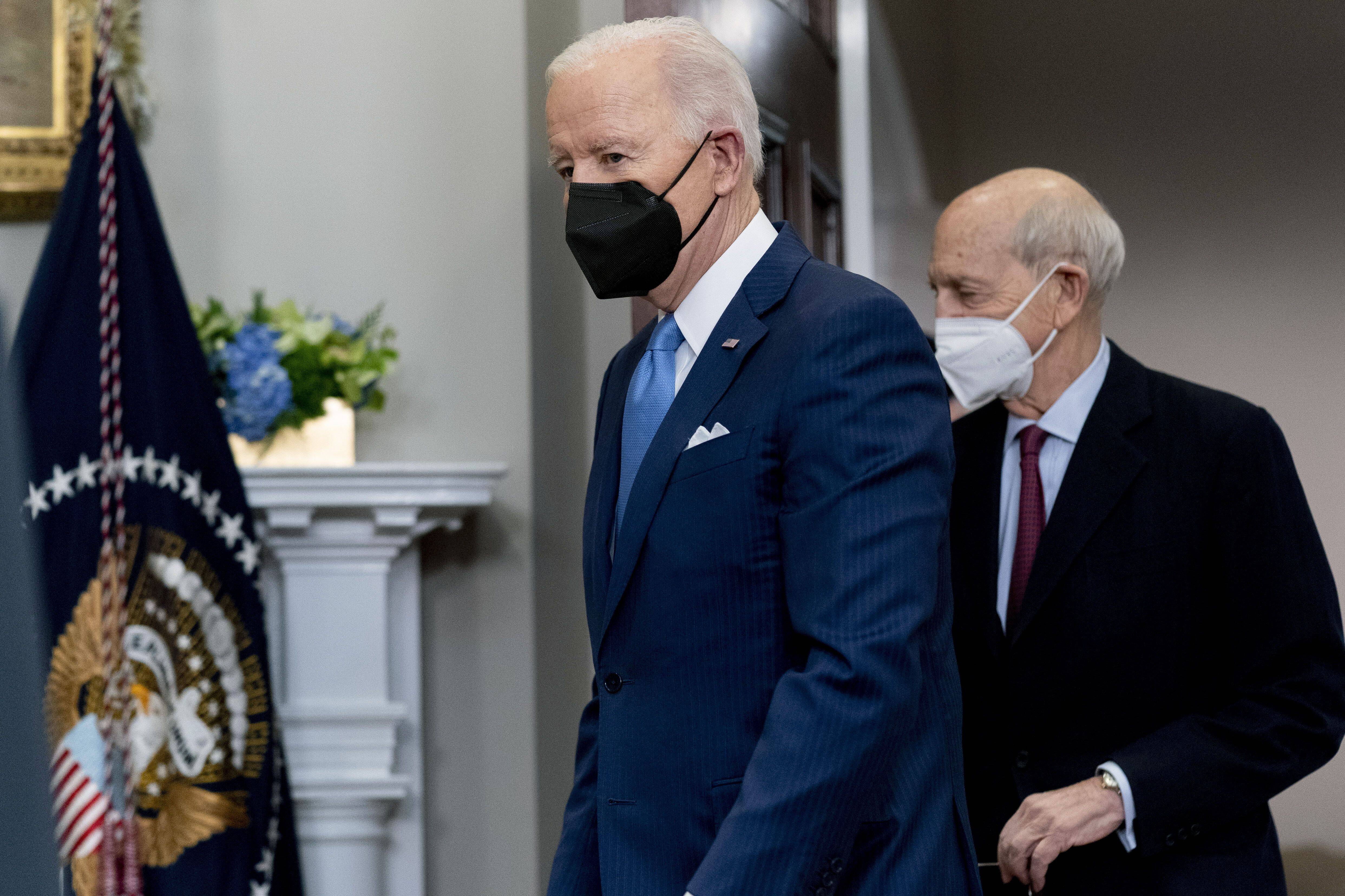 President Biden arrives with Supreme Court Associate Justice Stephen G. Breyer in the Roosevelt Room of the White House on Jan. 27 to announce Breyer's retirement. (Andrew Harnik/AP)