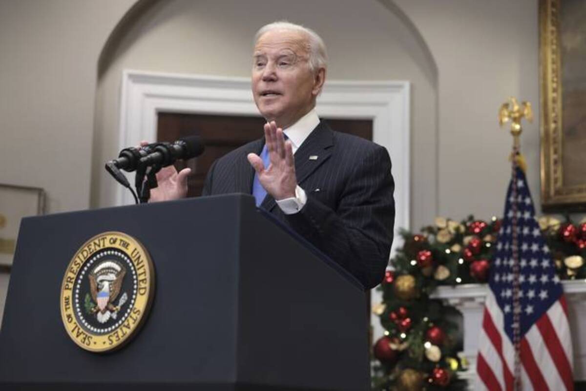Biden speaks about the omicron variant on Monday. (Anna Moneymaker/San Francisco Chronicle via AP)