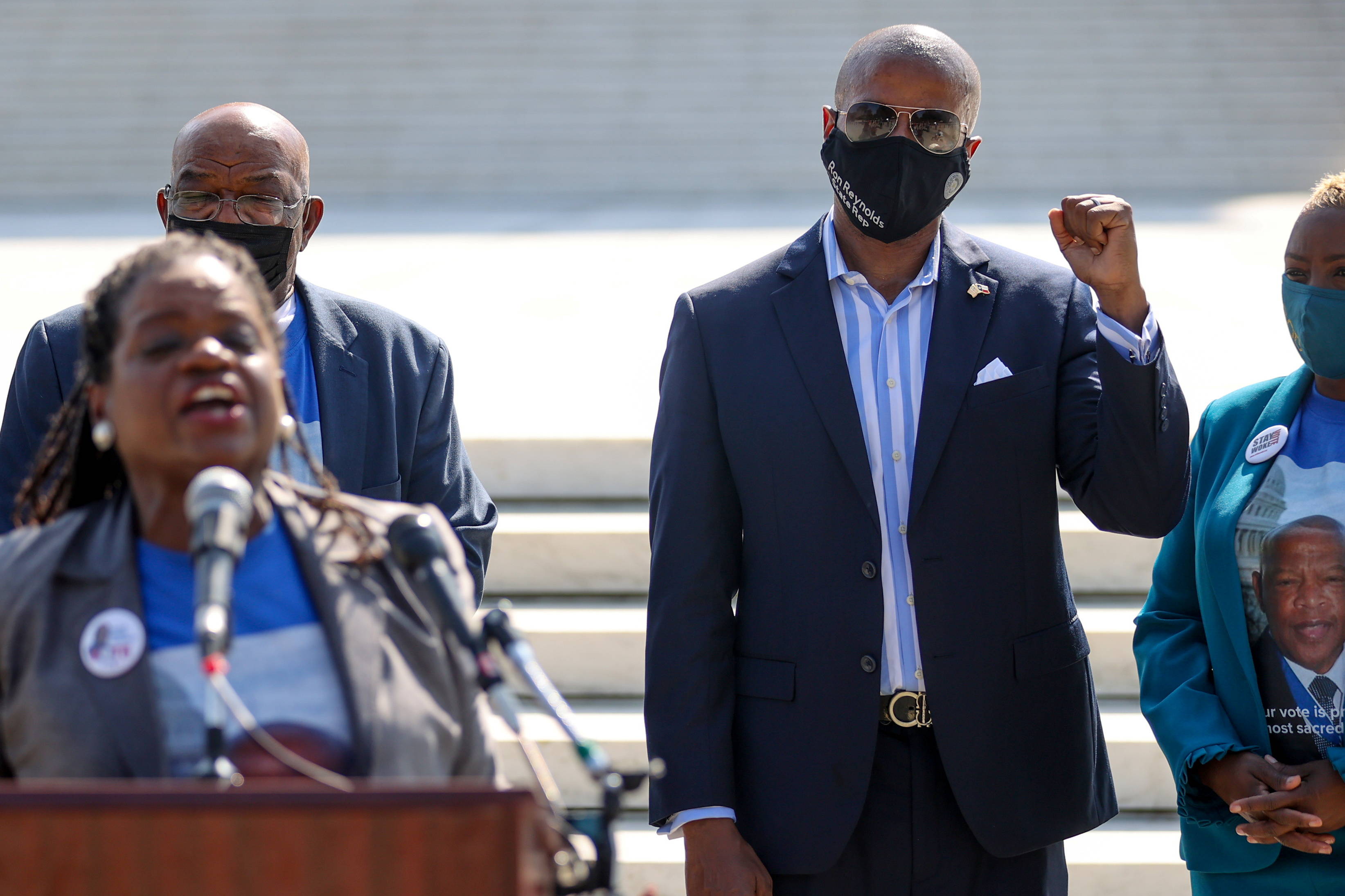 Texas Democratic lawmakers speak Wednesday as Republicans issue arrest warrants for them. (Jonathan Ernst / Reuters)