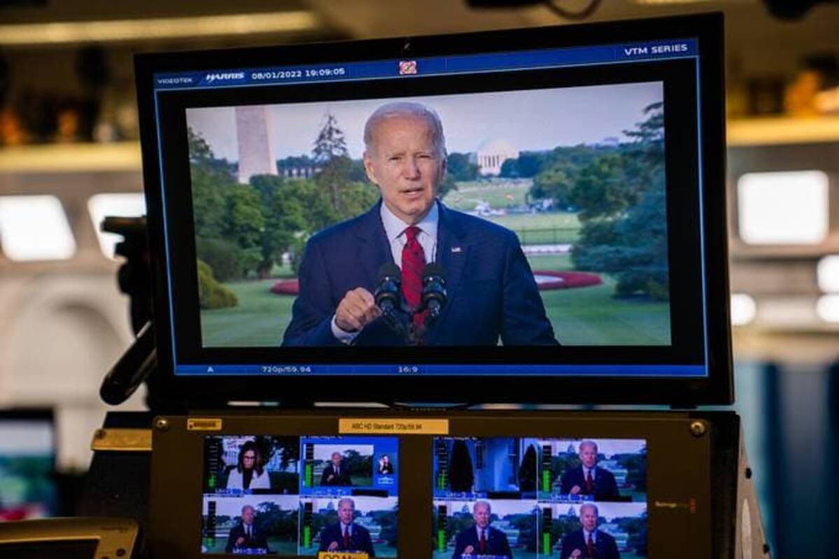President Biden on screen delivering remarks on the successful counterterrorism operation of the killing of al-Qaeda leader Ayman al-Zawahiri on Monday. (Demetrius Freeman/The Washington Post)