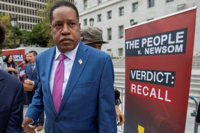 Republican gubernatorial recall candidate Larry Elder campaigns against California Gov. Gavin Newsom (D) in Los Angeles on Thursday. (Mike Blake/Reuters)