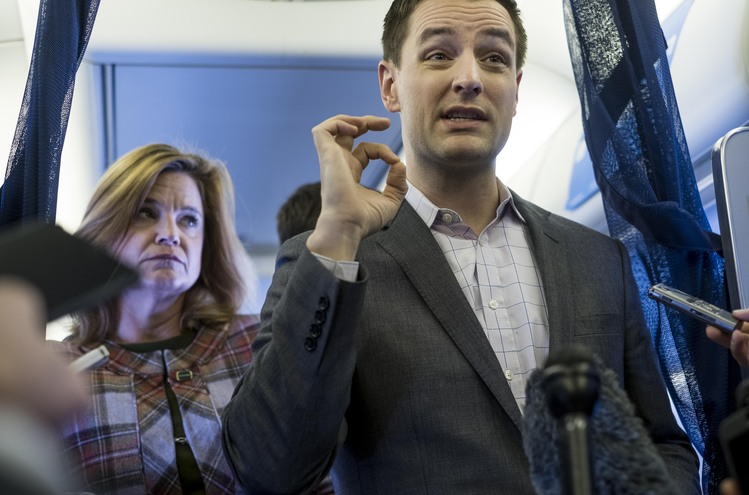 Robby Mook speaks to the traveling press corps aboard Hillary Clinton's campaign plane above Cedar Rapids, Iowa, on Oct. 28. (Melina Mara/The Washington Post)</p>  