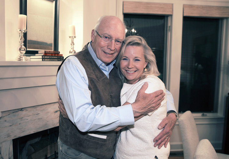 Liz Cheney gets a hug from her father, Dick, at his home in Wilson, Wyo., after the primary got called overnight. David Hume Kennerly provided the photo to the AP.</p>
