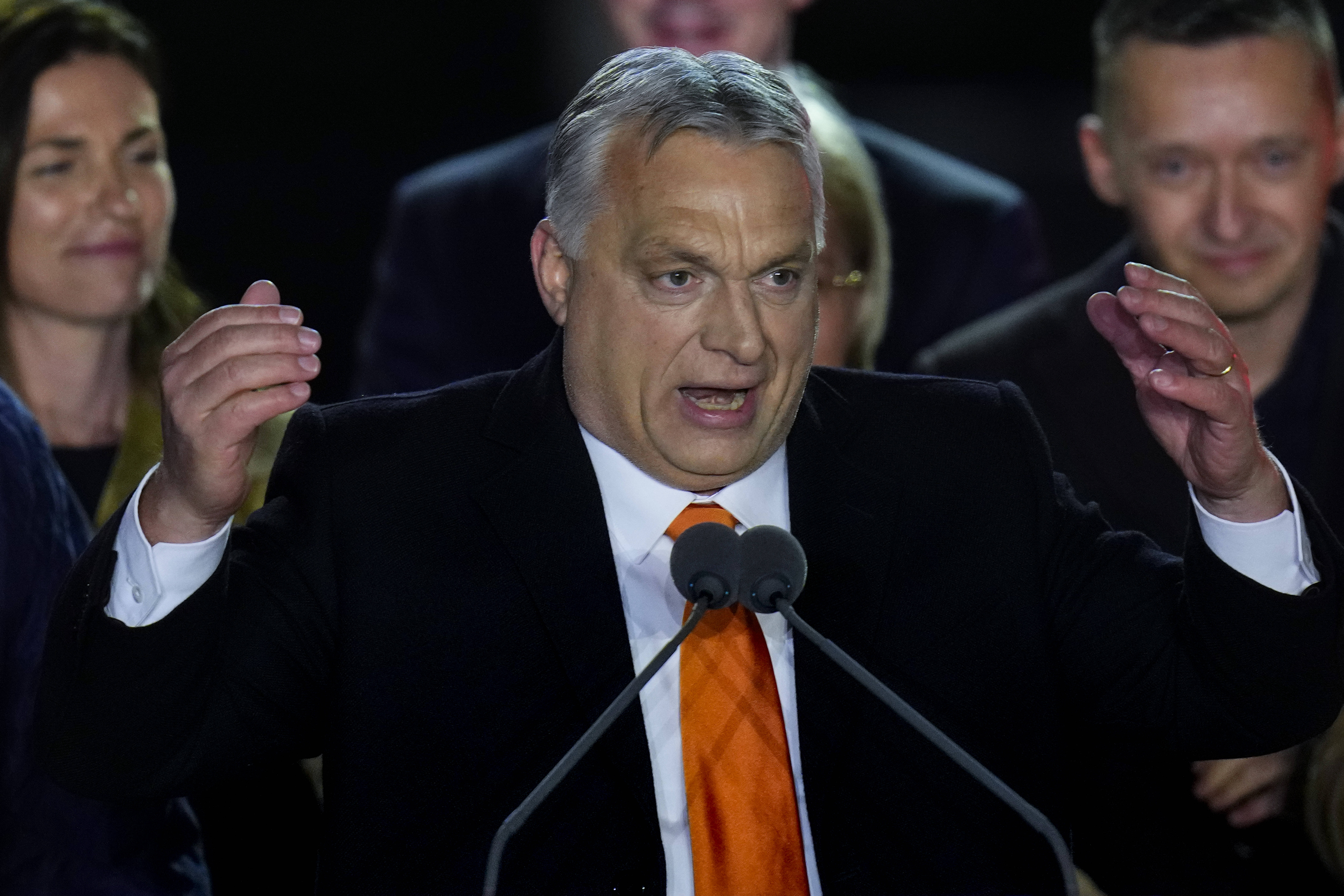 Hungary Prime Minister Viktor Orban addresses cheering supporters during an election night rally in Budapest on April 3. (Petr David Josek/AP)