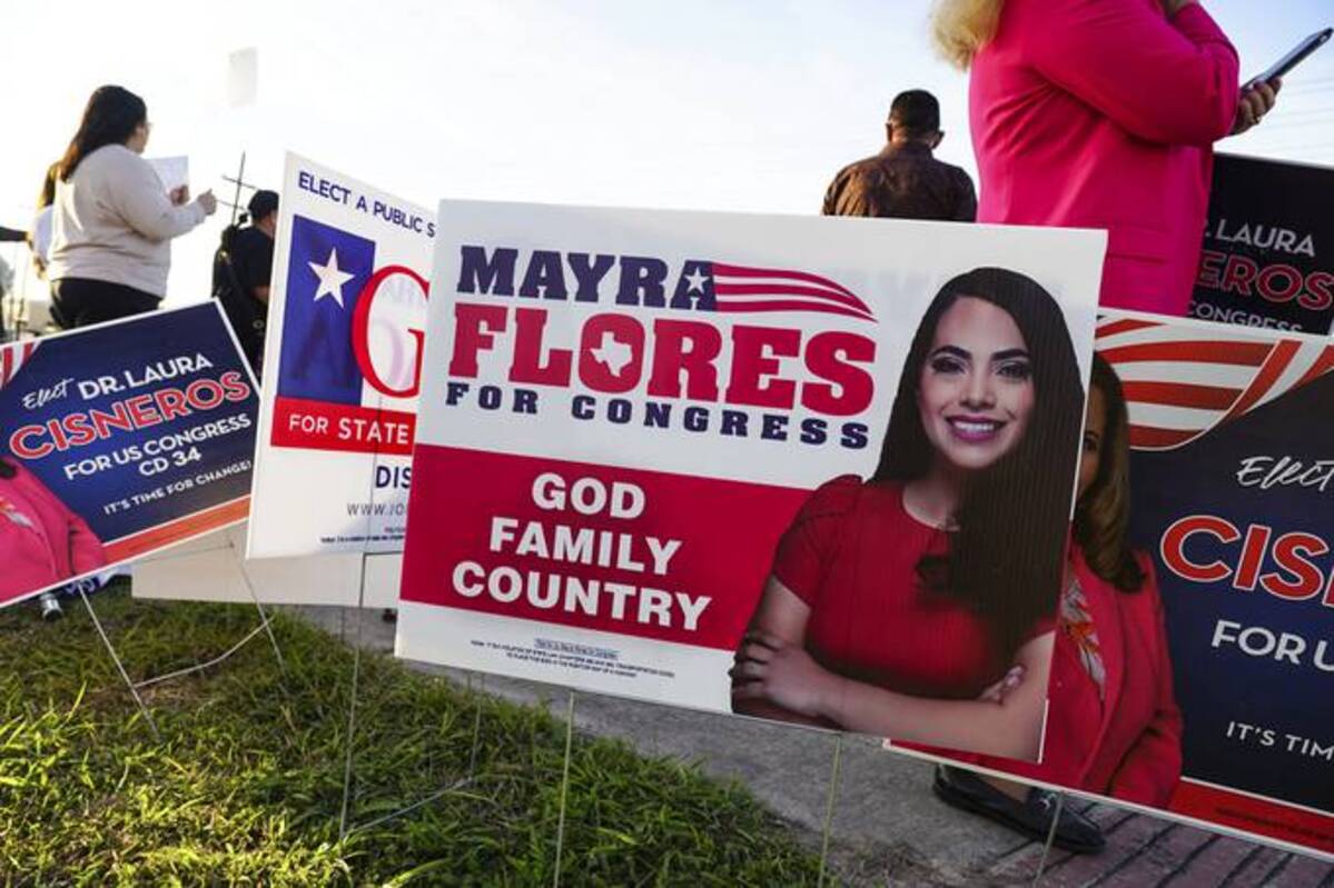 Campaign signs in the March 1 Texas primary election. (Denise Cathey/The Brownsville Herald via AP)