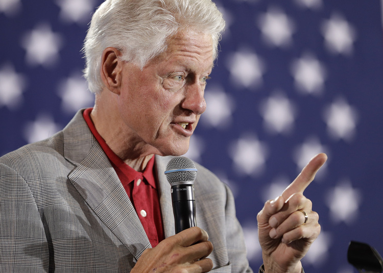 Bill Clinton speaks while campaigning for his wife in Las Vegas.&nbsp;(AP/John Locher)</p>  