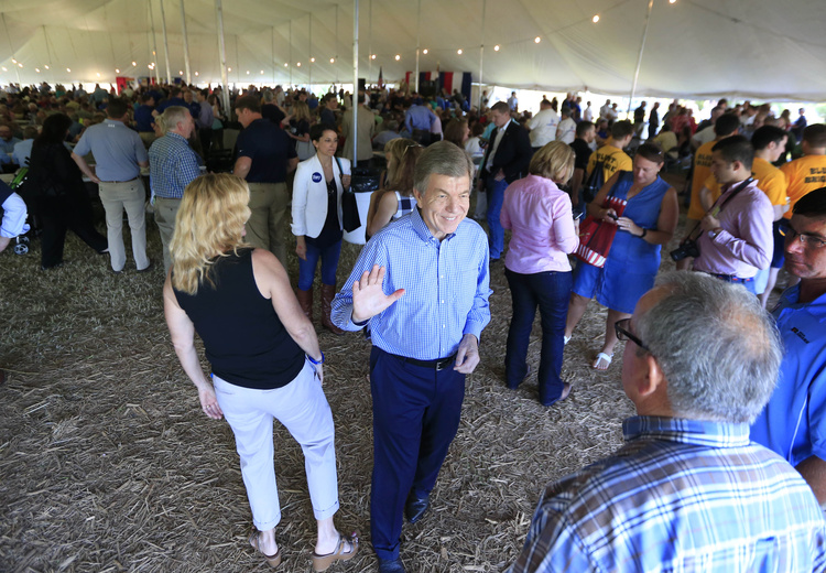 Sen. Roy Blunt (R-Mo.) waves to supporters at a ham breakfast on the Missouri State Fair grounds last month. (AP Photo/Orlin Wagner)</p>