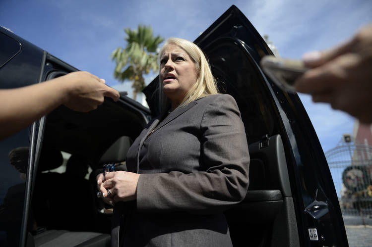 Puerto Rico Justice Secretary Wanda Vázquez Garced answers questions from reporters in San Juan. She is poised to become Puerto Rico's new governor next week. (Carlos Giusti/AP)  