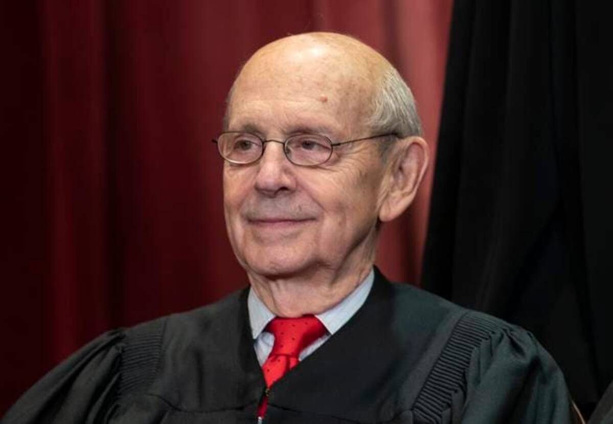Supreme Court Associate Justice Stephen G. Breyer, appointed by President Bill Clinton, sits with fellow Supreme Court justices for a group portrait at the Supreme Court Building on Nov. 30, 2018. (J. Scott Applewhite/AP)