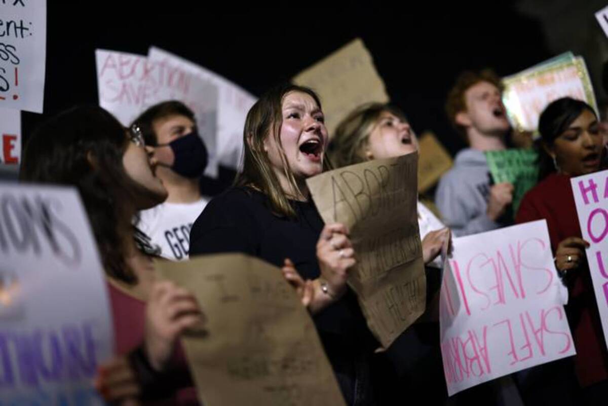 Demonstrators outside the U.S. Supreme Court early on Tuesday morning. Photographer: Ting Shen/Bloomberg