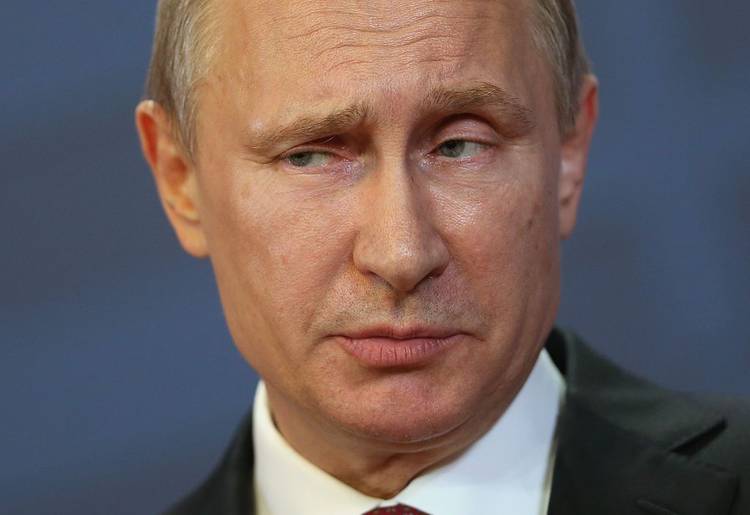 Russian President Vladimir Putin visits Hungary in 2015, a time when his country was already probing weaknesses in U.S. election systems. (Sean Gallup/Getty Images)  