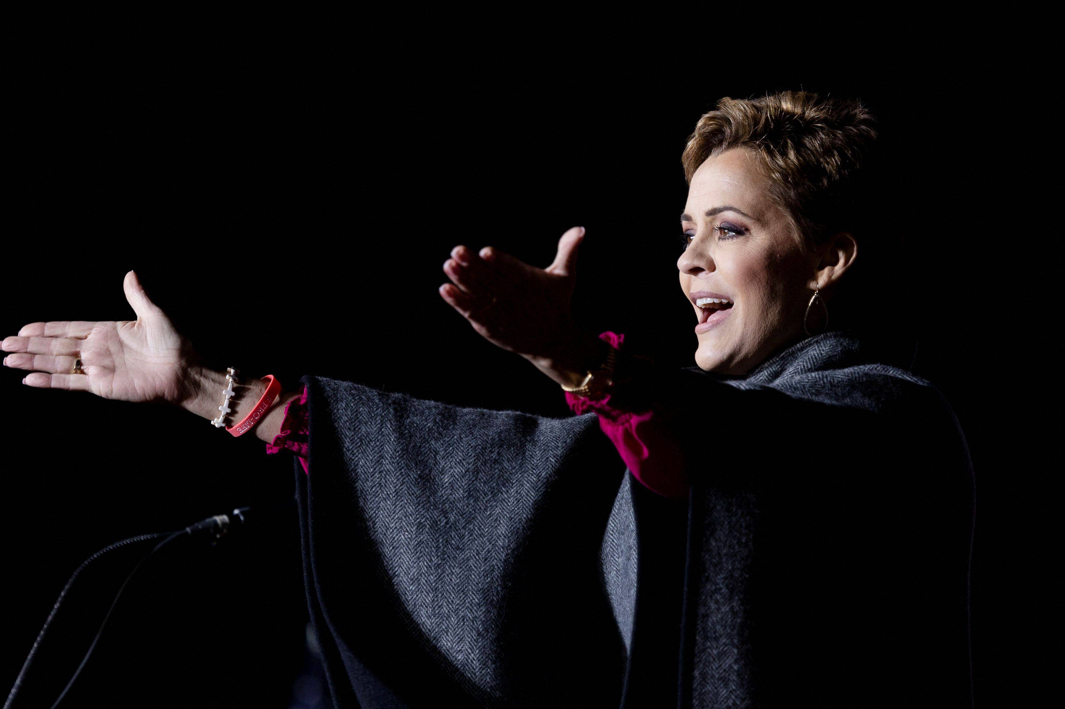 Republican candidate for Arizona governor Kari Lake speaks at a rally held by former president Donald Trump in Florence, Ariz., on Jan. 15. (Carlos Barria/Reuters)