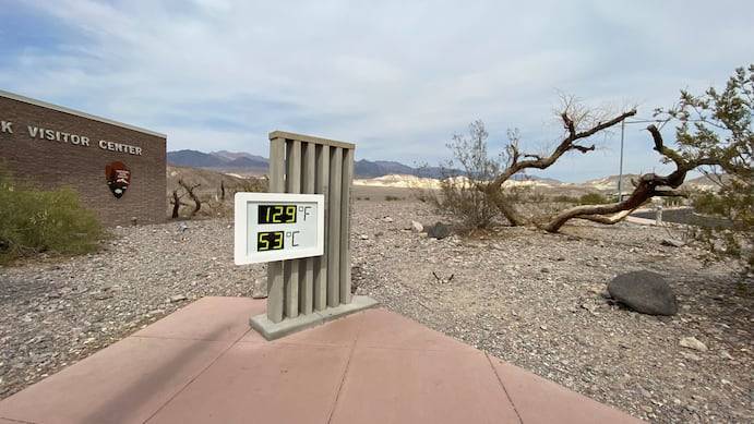 The thermometer at the Furnace Creek Visitor Center at Death Valley National Park in California shows a temperature reading of 129 degrees on June 16. (Norma Galeana/Reuters)