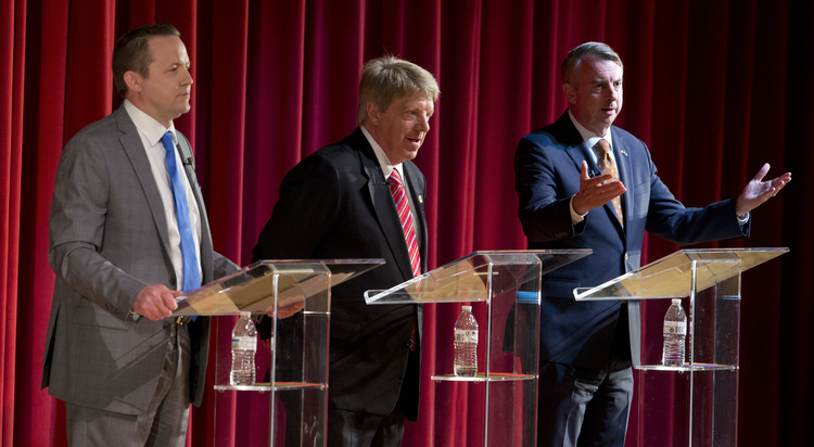 Ed Gillespie participates in a debate with Corey Stewart, left, and state Sen. Frank Wagner, center.&nbsp;(AP Photo/Steve Helber)</p>  