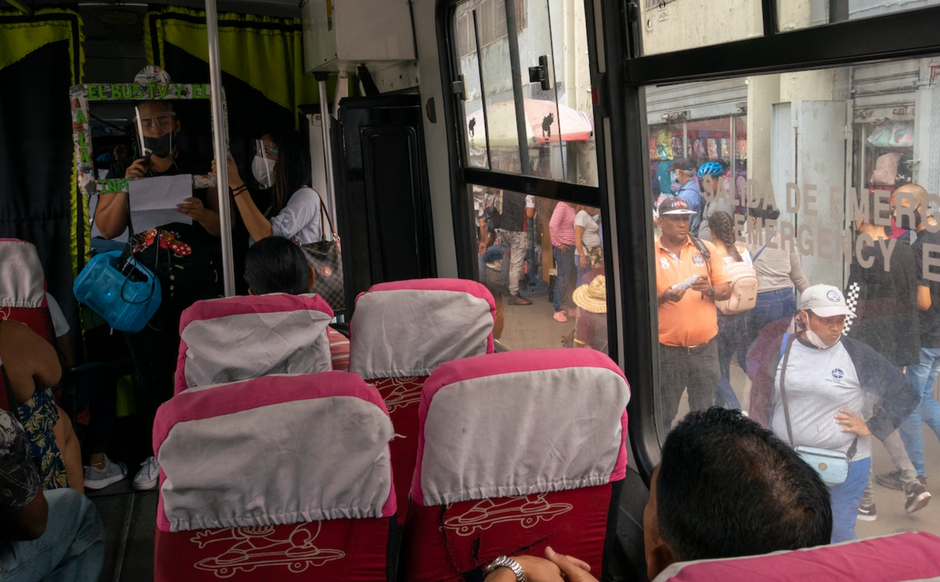 Wincarlys Ramos and Carla Cadenas present an El Bus TV newscast near the Caracas city center. (Andrea Hernández Briceño for The Washington Post)