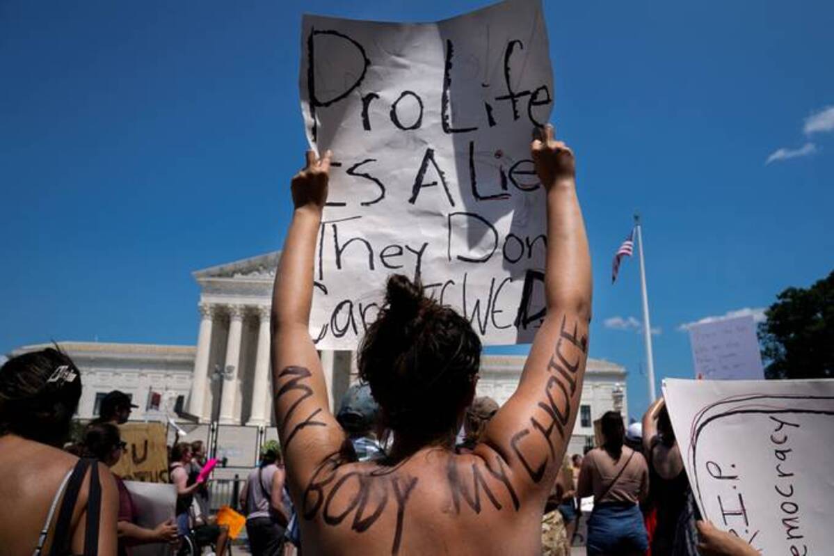 An abortion rights supporter protests outside the Supreme Court. (Elizabeth Frantz/Reuters)