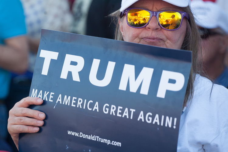 A supporter waits for Trump in Lynden, Washington, on Saturday.&nbsp;(Photo by Matt Mills McKnight/Getty Images)</p>  