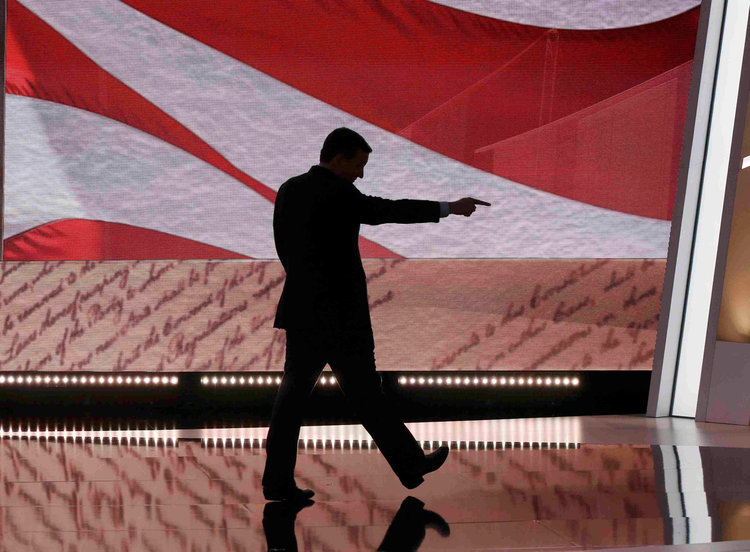 Ted Cruz leaves the stage to boos &nbsp;after speaking at the Republican National Convention in Cleveland last night.&nbsp;(Mike Segar/Reuters)</p>  