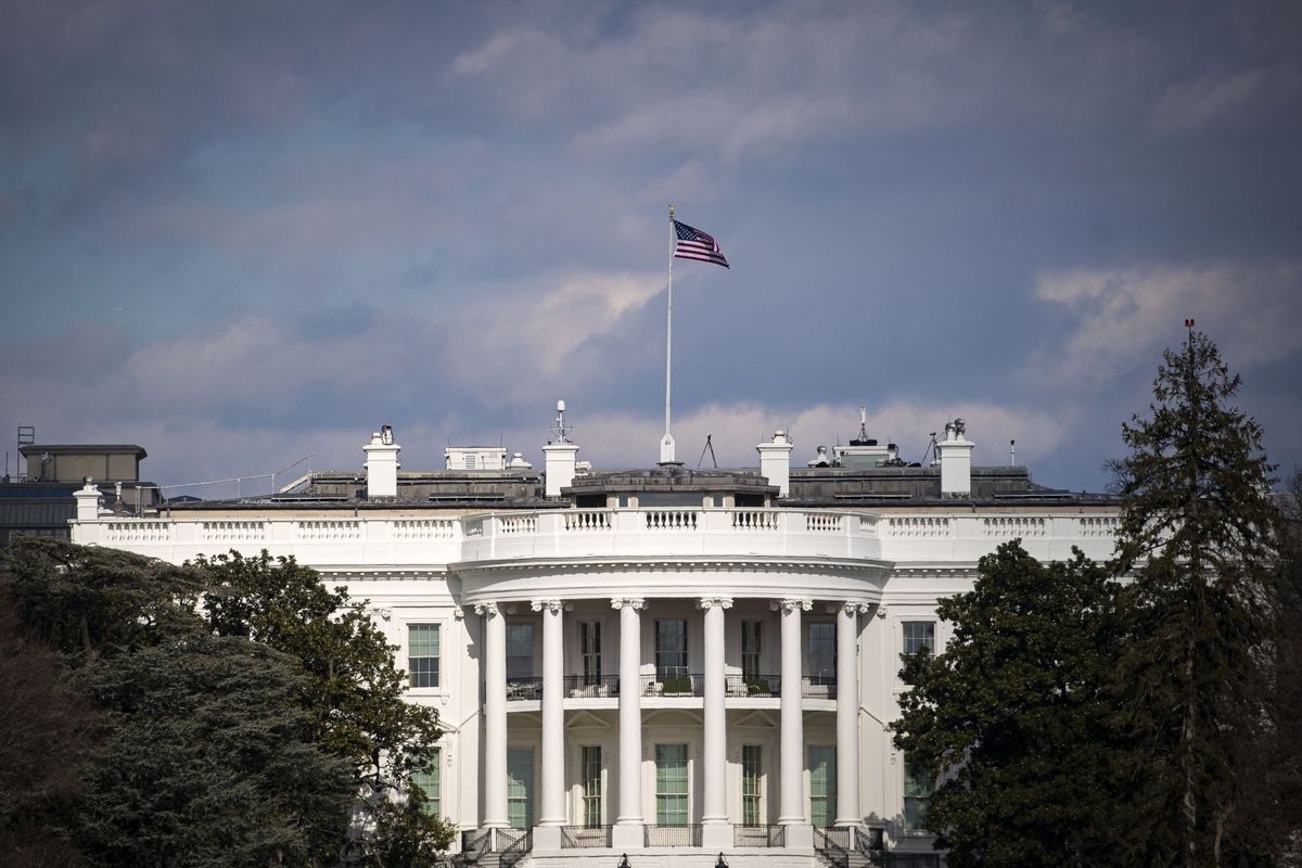 The proposal comes years after criminals began applying for benefits amid the pandemic . (Al Drago/Bloomberg News)